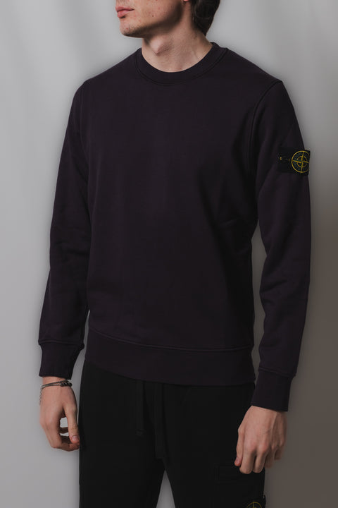 STONE ISLAND FELPA REALIZZATA NEL CLASSICO TESSUTO FELPA CON BADGE LOGO SU BRACCIO